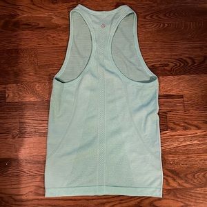 Teal blue lululemon run swiftly high neck tank size 4